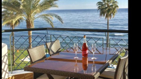 Гостиница MI CAPRICHO Beachfront Apartment  Калаонда